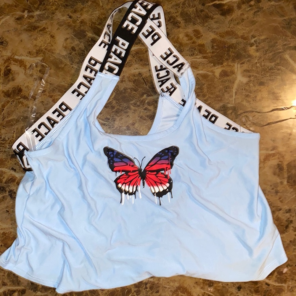 butterfly crop top, crosses in the back